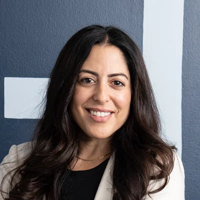 A headshot photo of Dr. Nora Zoma